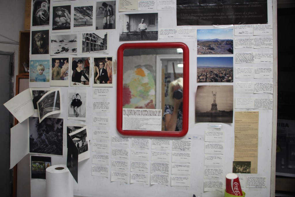 Studio wall with self-portrait