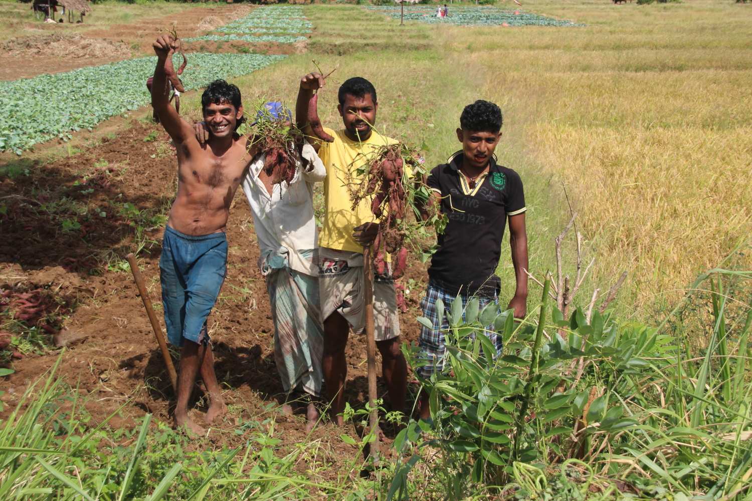 Showing off the radish harvest